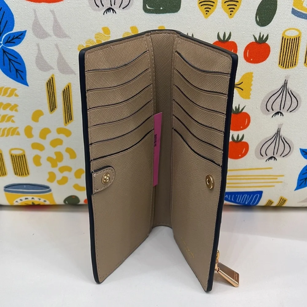 Kate Spade Morgan Colorblocked Slim Bifold Wallet Cafe Mocha
NWT - Picture 7 of 16